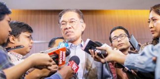 Anwar Insists Putrajaya’s RM250B Stimulus Be Presented in Parliament