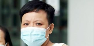 Woman in Viral Video Charged with Threatening, Spitting at KFC Staff