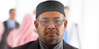 Kit Siang: How a Cabinet Minister Became a Fugitive from Justice?