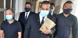 Datuk pleads guilty to assaulting hotpot restaurant workers, customers