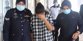 Teenage college student who allegedly threw baby out of window out on RM90k bail