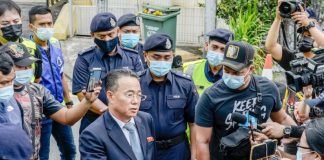North Korean diplomatic staff, families leave for home