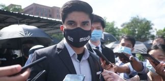 Cops seize Syed Saddiq’s phone in probe over custodial death post