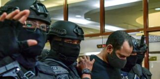 Israeli man pleads not guilty to firearms trading, ammunition possession